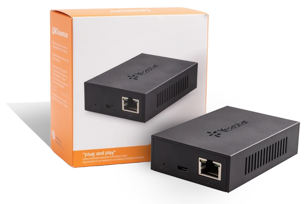 The Yeastar TA100 VoIP adapter from Bravo Telecom next to its box, illustrating the 